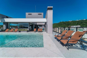 Adra 103 - Apartamento no centro de Bombinhas - Rooftop com piscina e academia - À poucos metros da praia
